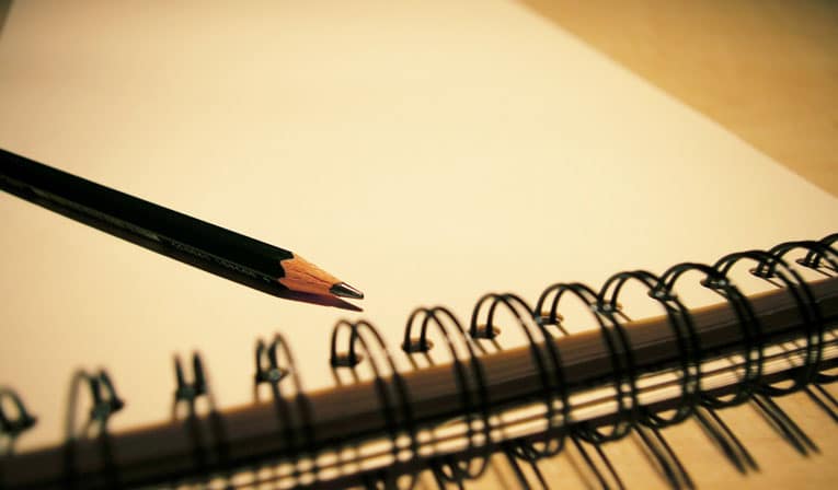 Pencil and a pad of paper